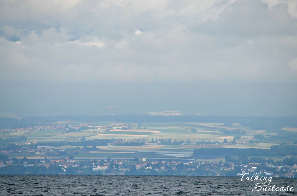 A peek at Switzerland on a cloudy day from Gavotnaute boat in Evian, France