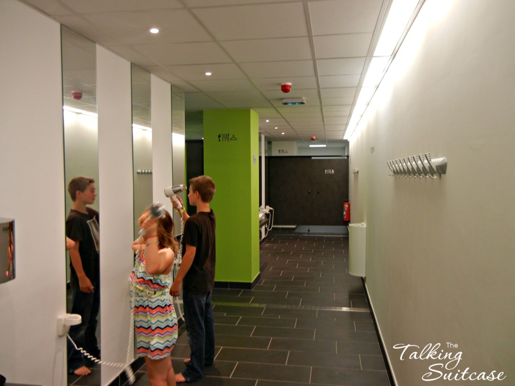 Kids getting cleaned up in the locker room of Forme D'O