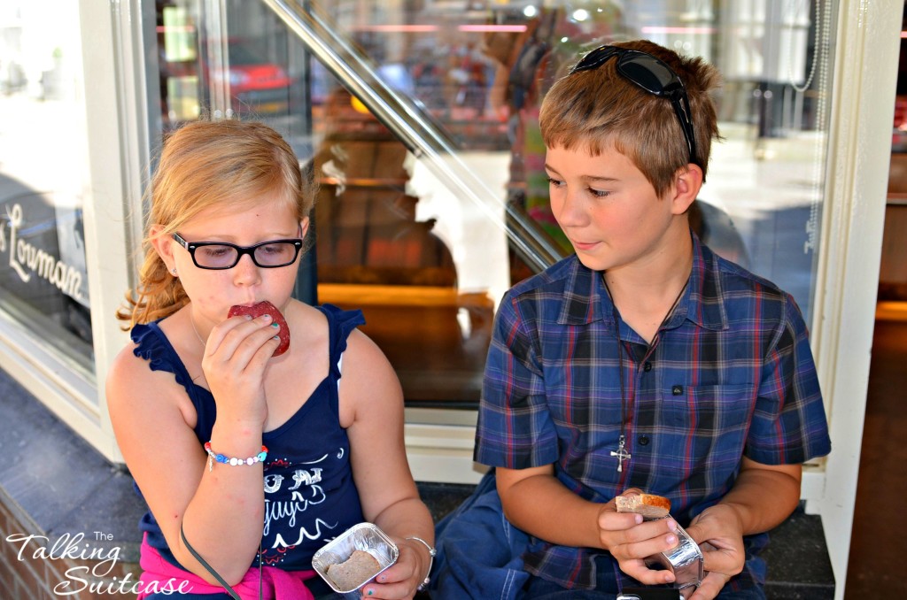 Kids enjoying sausage at Butcher Louman in Amsterdam