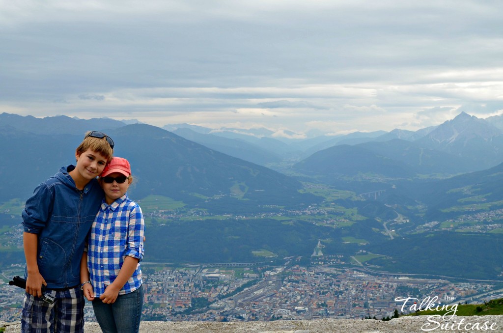 Kids posing at the Seegrube station overlooking the city of Innsbruck