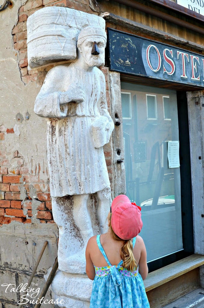 Lucy looking at the man with the iron nose in Vencie